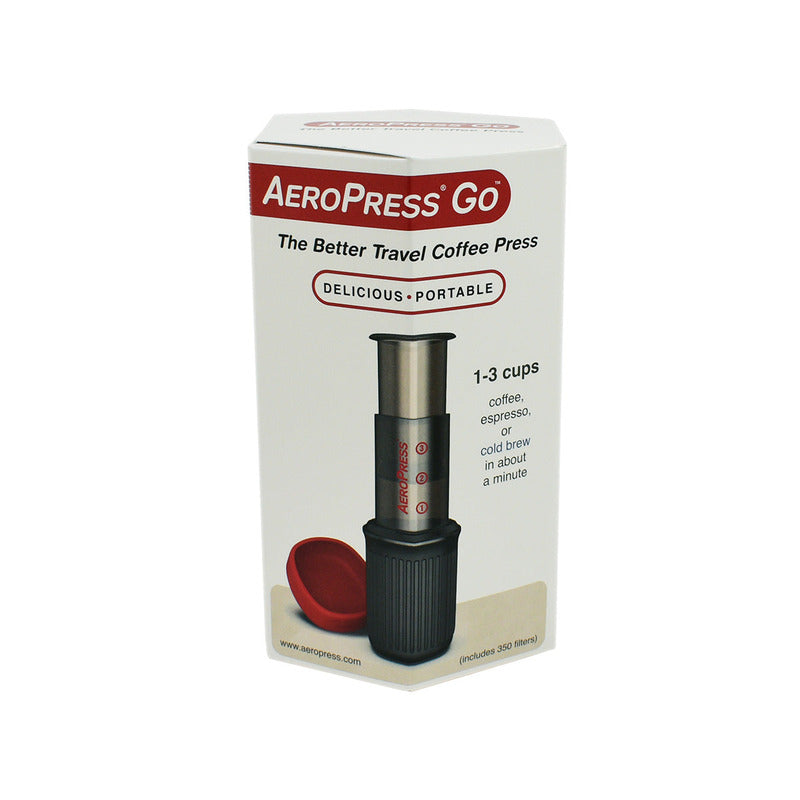 Retail packaging for AeroPress Go showing product image and text promoting portability and quick brewing.
