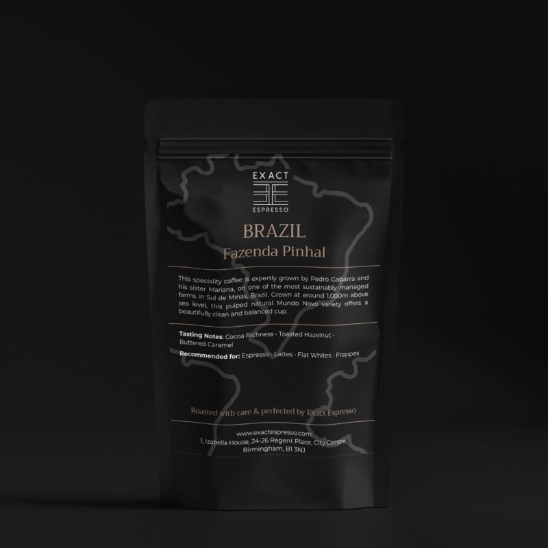 Exact Espresso Brazil Fazenda Pinhal coffee bag photographed on a dark background, showing premium product details.