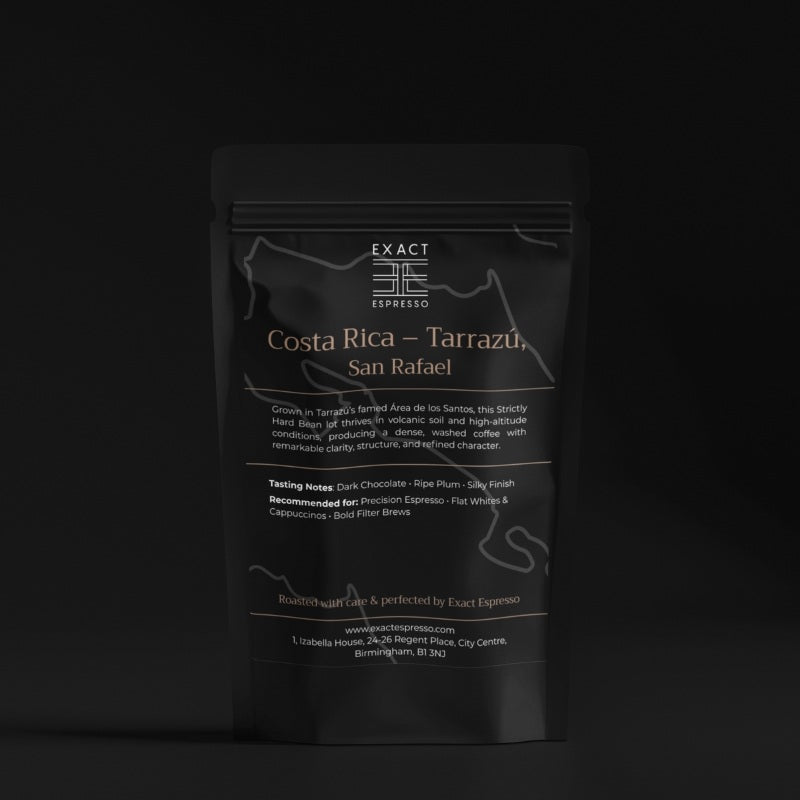 Costa Rican Tarrazú San Rafael coffee bag photographed on a dark background with premium-style packaging and minimalist design.