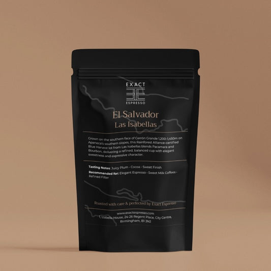 Exact Espresso’s El Salvador Las Isabellas coffee bag displayed against a warm beige background, showing details about flavour and origin.