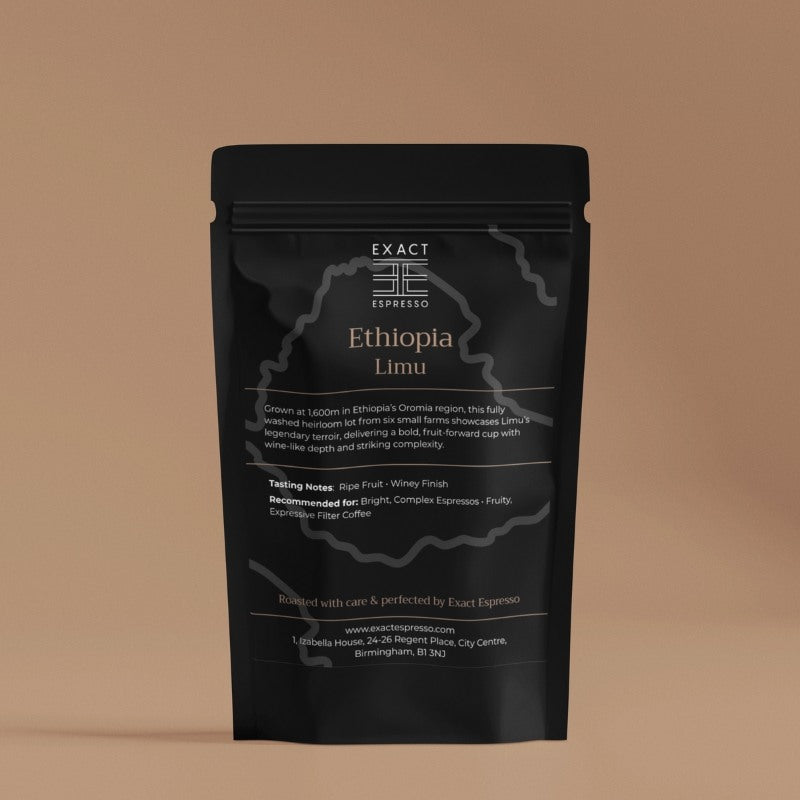 Black coffee bag labeled “Ethiopia Limu” with origin and tasting notes printed on front, placed against a soft brown background