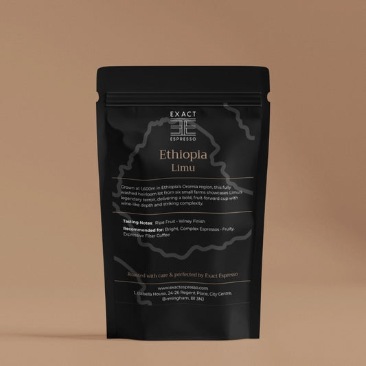Black coffee bag labeled “Ethiopia Limu” with origin and tasting notes printed on front, placed against a soft brown background