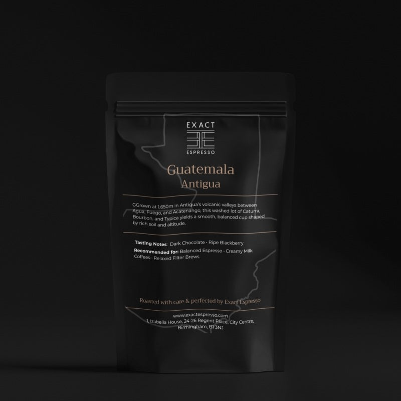 Premium Guatemala Antigua coffee bag from Exact Espresso shown against a dark background, highlighting the label with detailed origin and flavour profile.