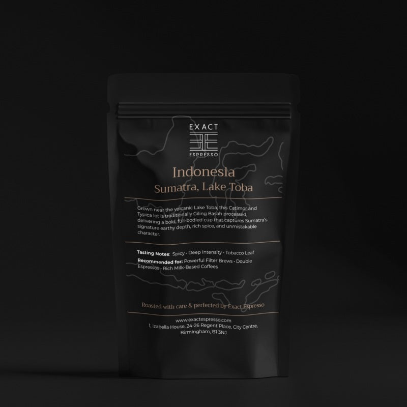 Dark-themed product shot of the Indonesia Sumatra, Lake Toba coffee bag by Exact Espresso, highlighting label text and topographical design.