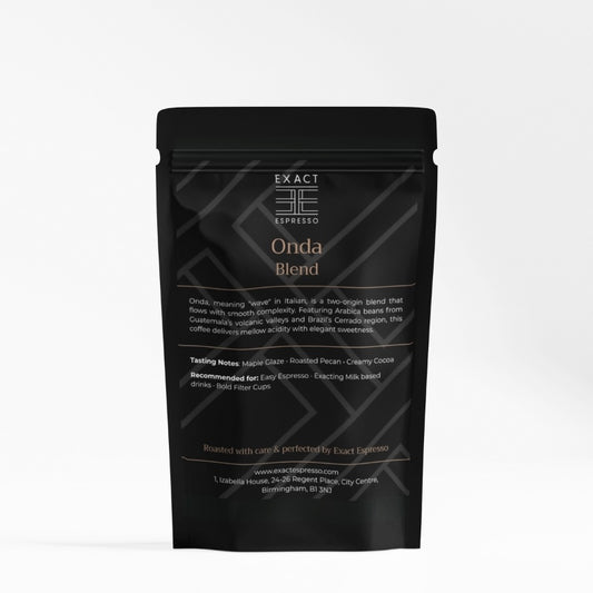 Black coffee bag labeled “Onda Blend” from Exact Espresso on white background