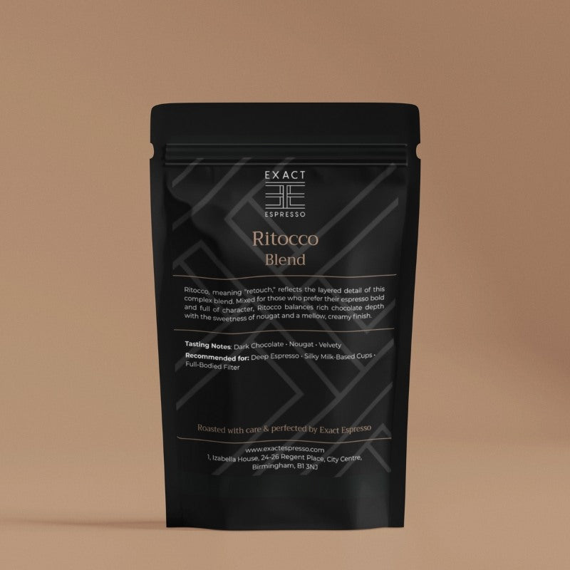 Ritocco Blend coffee bag on a warm background, showcasing Exact Espresso's luxury packaging.