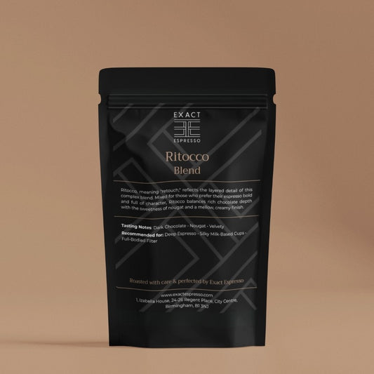 Ritocco Blend coffee bag on a warm background, showcasing Exact Espresso's luxury packaging.