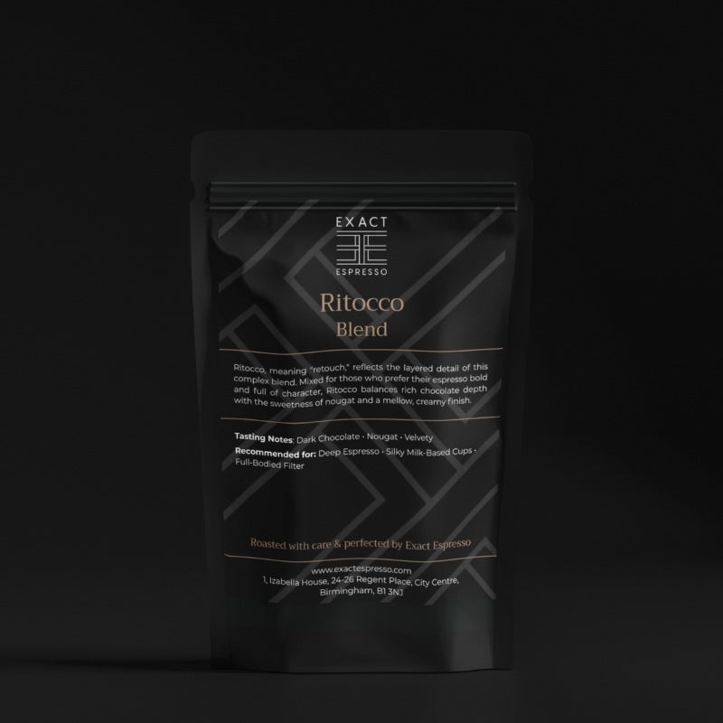 Exact Espresso’s Ritocco Blend bag in a dark setting, highlighting premium branding.