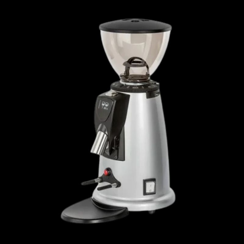 Silver commercial coffee grinder with large bean hopper and dosing spout.