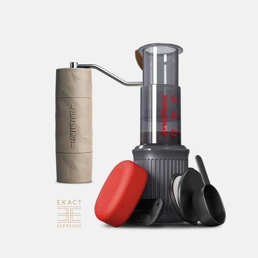 AeroPress Go coffee maker with red case shown alongside Comandante X25 Trailmaster grinder.