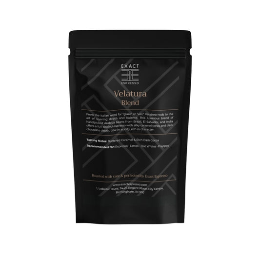 Exact Espresso Velatura Blend black coffee bag with gold text on a white background.
